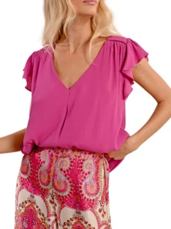 Top manches courtes fuchsia uni avec une coupe droite et un col v