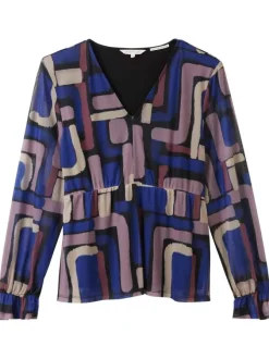 Top multicolore imprimé avec une coupe ample un col v et des manches longues