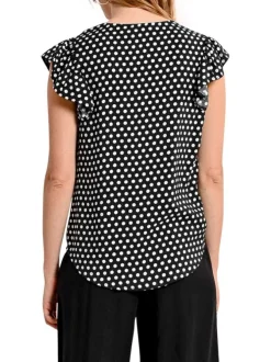 Top noir à pois avec une coupe droite un col v et des manches courtes