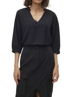 Top noir uni avec une coupe droite un col v et des manches 3/4 ballon