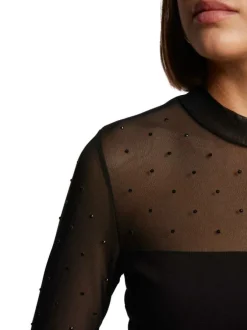 Top noir uni à coupe ajustée, col montant et à manches longues transparentes