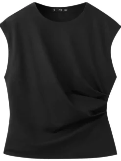 Top noir uni sans manche pourvu d'une coupe ajustée et d'un col rond