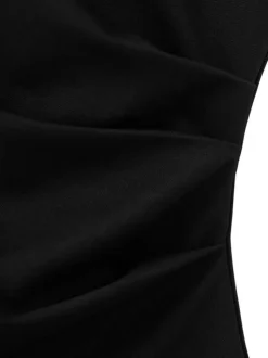Top noir uni sans manche pourvu d'une coupe ajustée et d'un col rond