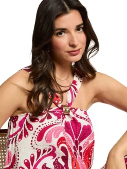 Top rose imprimé pourvu d'une coupe ample et d'un col croisé