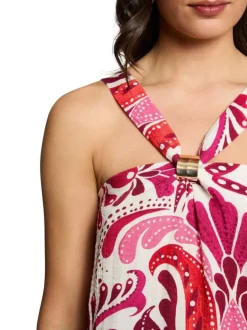 Top rose imprimé pourvu d'une coupe ample et d'un col croisé