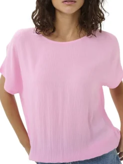 Top rose uni pourvu d'une coupe ample et de manches courtes