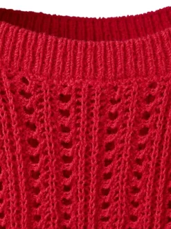 Top rouge uni sans manche pourvu d'un col rond et d'une coupe droite