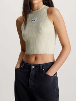 Top tilleul côtelé sans manches avec une coupe cropped et un col montant