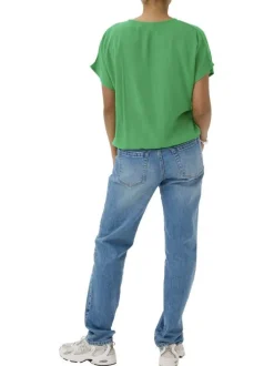 Top vert uni pourvu d'une coupe ample et de manches courtes