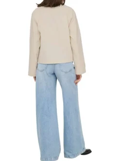 Trench April court beige uni avec une coupe droite et un col revers