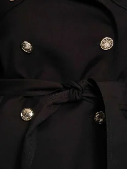 Trench coat noir uni mi-long à coupe droite avec une ceinture à la taille