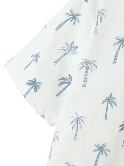 T-shirt en coton biologique blanc avec des palmiers imprimés et un col rond