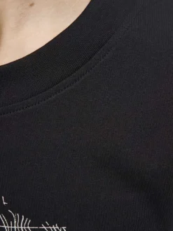 T-shirt en coton noir avec logo blanc imprimé et une coupe droite