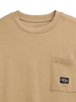 T-shirt manches courtes en coton beige uni avec une coupe oversize