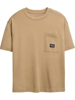 T-shirt manches courtes en coton beige uni avec une coupe oversize