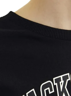 T-shirt manches longues en coton noir uni avec une coupe droite et un col rond