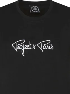 T-shirt noir uni col rond, à manches courtes avec liseret au nom de la marque
