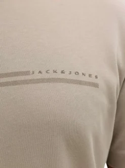 T-shirt beige uni avec une coupe droite, un col rond et des manches courtes