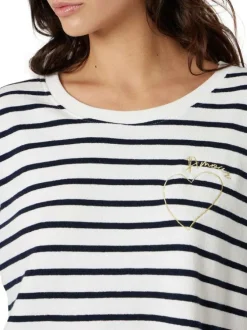 T-shirt blanc à rayures pourvu d'un col rond et de manches longues