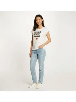 T-shirt blanc uni pourvu de manches courtes et d'un col rond