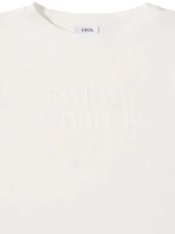 T-shirt blanc uni pourvu de manches courtes et d'un col rond