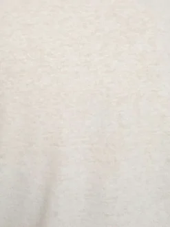 T-shirt blanc uni pourvu d'une coupe droite et d'un col en V