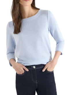 T-shirt bleu clair à rayures pourvu d'une coupe droite et d'un col rond