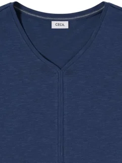 T-shirt bleu uni pourvu de manches courtes et d'une coupe droite