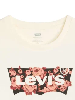 T-shirt écru en coton avec motif floral de la marque et col rond