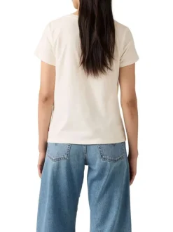 T-shirt écru en coton avec motif floral de la marque et col rond