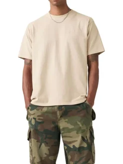 T-shirt en coton beige à coupe droite pourvu d'un col rond finement côtelé