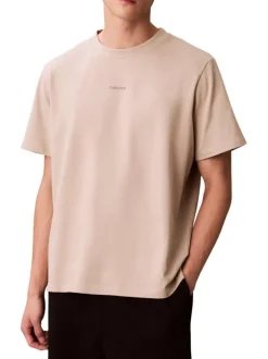 T-shirt en coton beige à coupe droite pourvu d'un col rond ras de cou