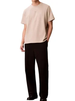 T-shirt en coton beige à coupe droite pourvu d'un col rond ras de cou