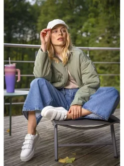 T-shirt en coton beige imprimé au dos à coupe oversize et col rond