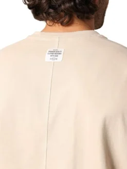 T-shirt en coton beige uni avec un col rond et des manches courtes