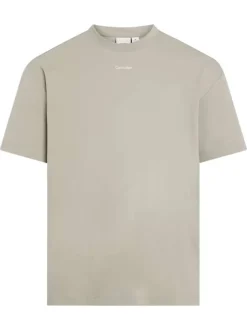 T-shirt en coton beige uni avec une coupe oversize et un col rond