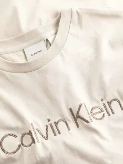 T-shirt en coton beige uni à coupe droite avec le nom de la marque imprimé