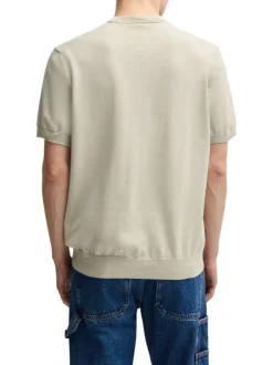 T-shirt en coton beige uni en maille avec une coupe oversize et un col rond