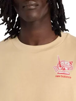T-shirt en coton beige uni pourvu d'un col rond et de manches courtes
