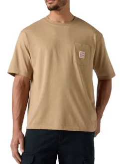 T-shirt en coton beige uni pourvu d'un col rond et de manches courtes