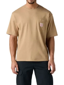 T-shirt en coton beige uni pourvu d'un col rond et de manches courtes