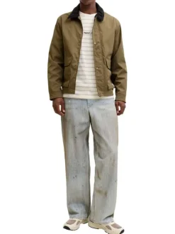 T-shirt en coton biologique beige à rayures pourvu d'un col rond