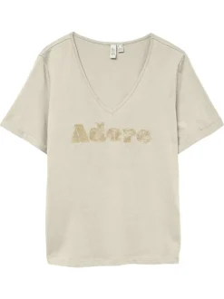 T-shirt en coton biologique écru avec inscription "Adore" en paillettes dorées