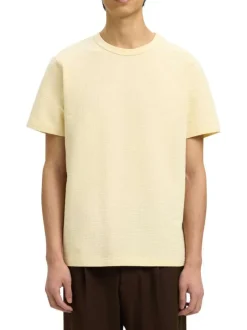 T-shirt en coton biologique jaune uni avec une coupe droite