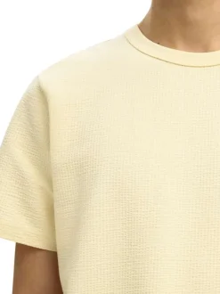 T-shirt en coton biologique jaune uni avec une coupe droite
