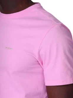 T-shirt en coton biologique rose uni avec une coupe droite et un col rond