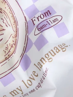 T-shirt en coton blanc à motifs imprimés pourvu d'une coupe droite