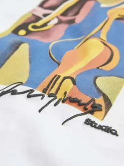 T-shirt en coton blanc uni avec des musiciens et une coupe droite à col rond