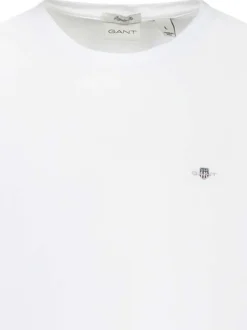 T-shirt en coton blanc uni avec un col rond et le logo brodé à la poitrine