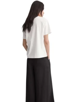 T-shirt en coton blanc uni avec une coupe droite et un col rond